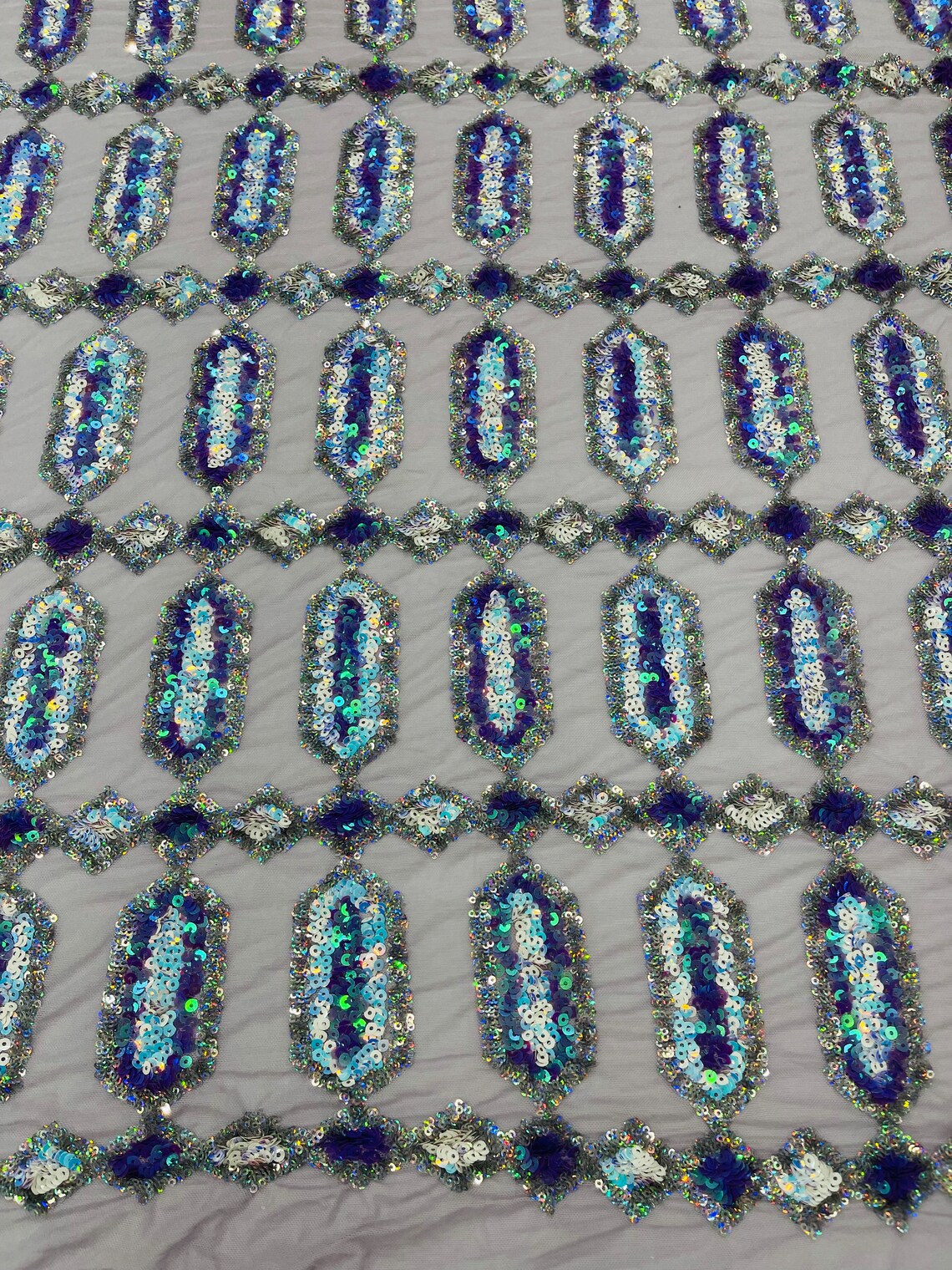 Geometric Luxury Fashion Design with Sequins Embroider on a 4 Way Stretch Mesh Fabric-Sold by The Yard. Lilac/Aqua