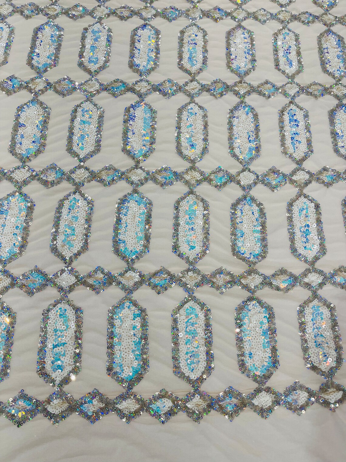 Geometric Luxury Fashion Design with Sequins Embroider on a Cream 4 Way Stretch Mesh Fabric-Sold by The Yard. Aqua/Silver