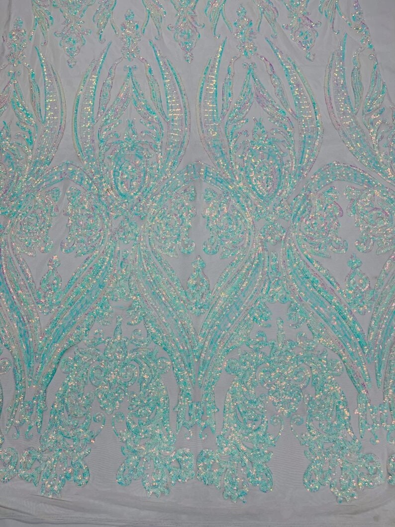 Luxury Fashion Design with Sequins Embroider on a 4 Way Stretch Mesh Fabric-Sold by The Yard. Aqua Blue Iridescent