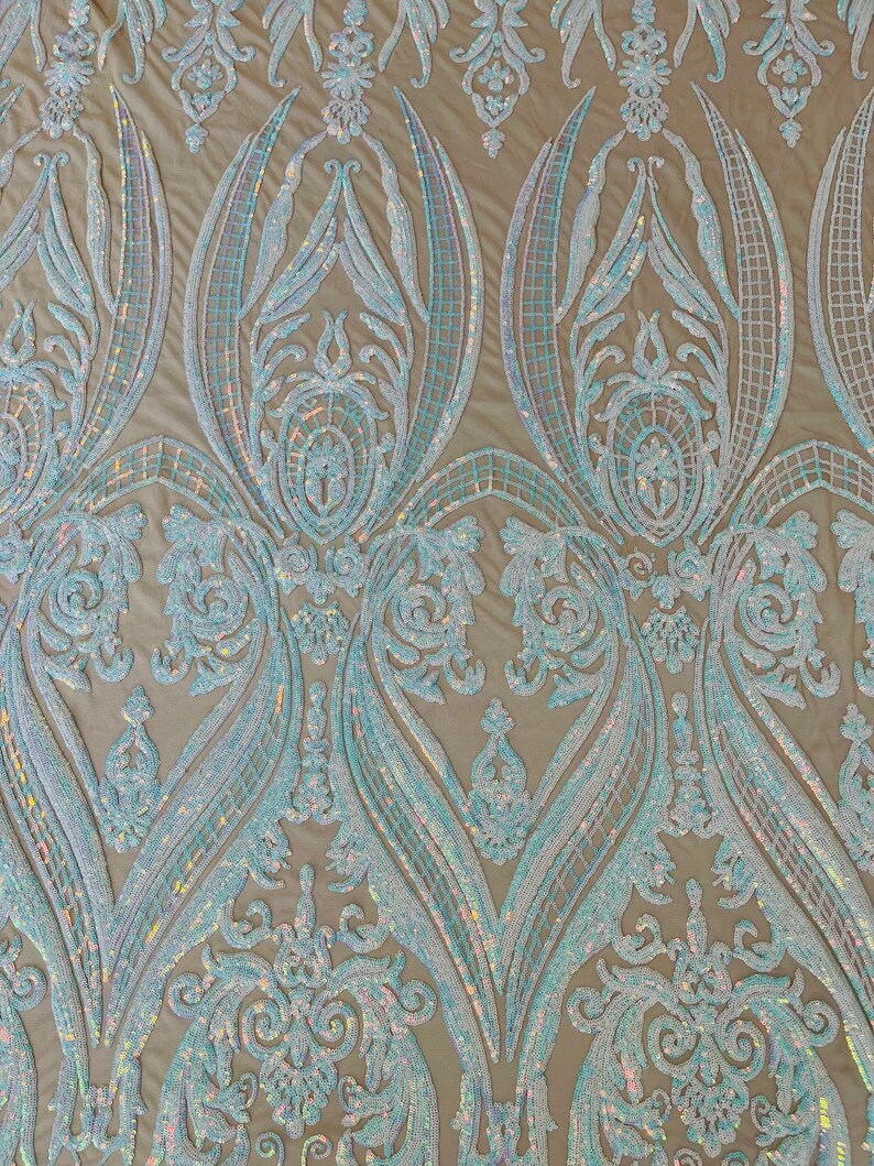 Luxury Fashion Design with Sequins Embroider on a 4 Way Stretch Mesh Fabric-Sold by The Yard. Clear Aqua Iridescent