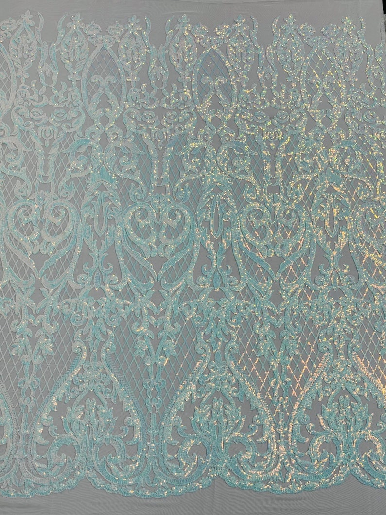 Hight Designs Fashion Design with Sequins Embroider on a 4 Way Stretch Mesh Fabric-Sold by The Yard. Clear Aqua Iridescent