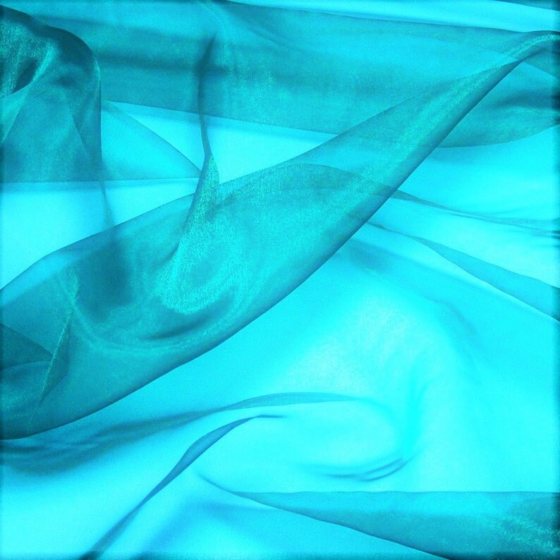 Polyester Soft Light Weight, Sheer, See Through Crystal Organza Fabric Sold By The Yard. Teal Blue