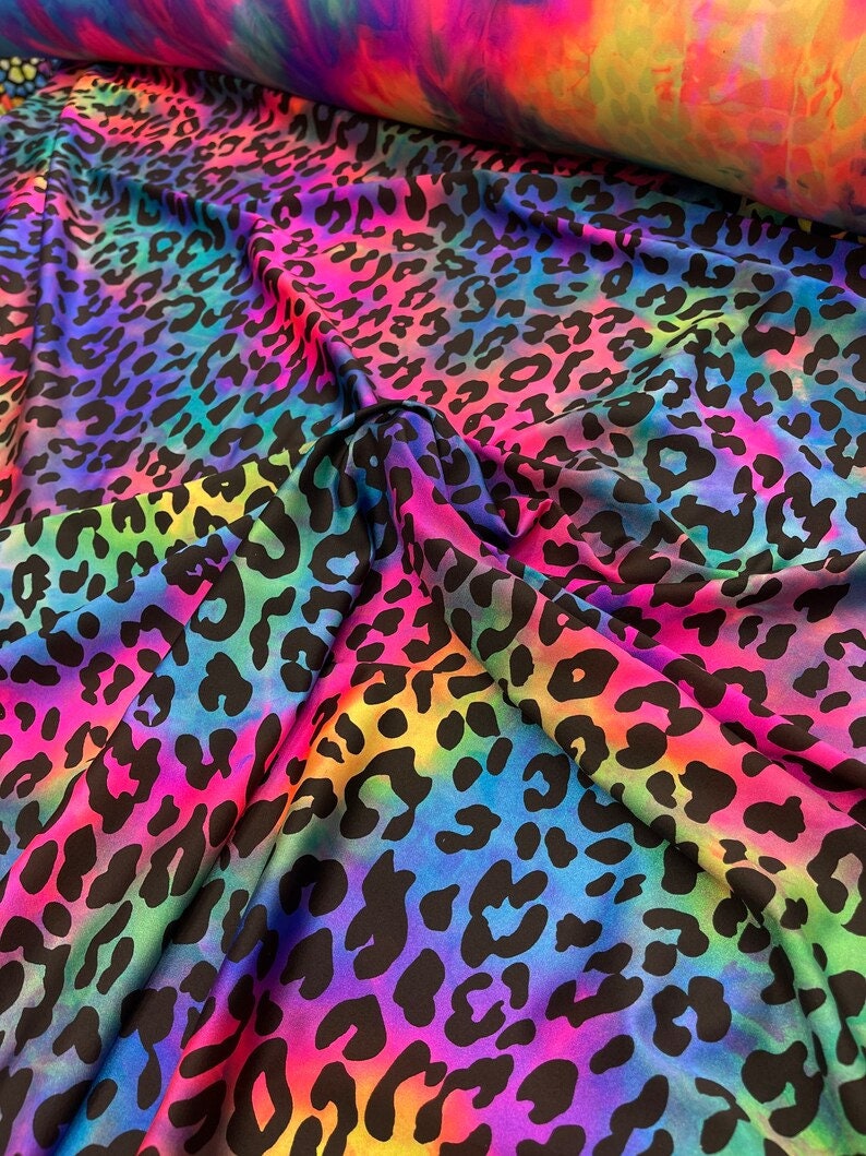 4 Way Stretch Leopard Animal Print on Tie dye Nylon Spandex Fabric Sold By Yard.