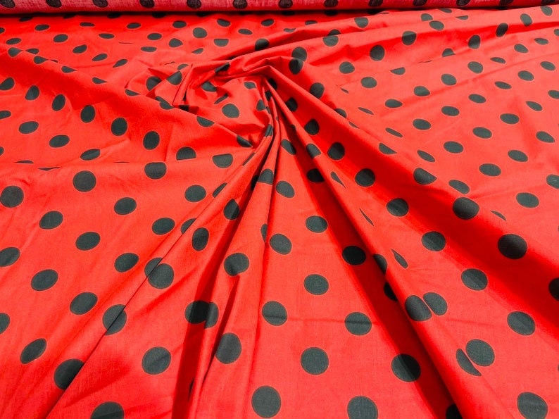 Premium 1 inch Polka Dot Poly Cotton Fabric Sold By The Yard. Black on Red