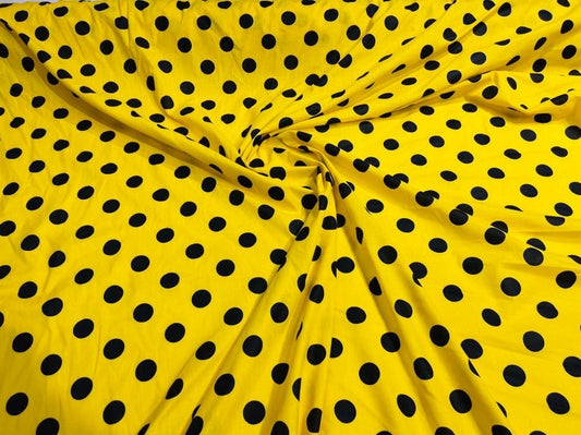 Premium 1 inch Polka Dot Poly Cotton Fabric Sold By The Yard. Black on Yellow