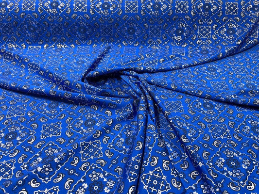 Metallic Bandanna Print on a Stretch Tricot Spandex Fabric- Sold by Yard. Royal Blue