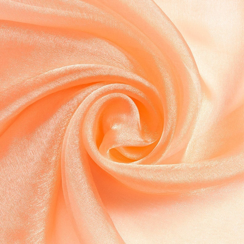 Polyester Soft Light Weight, Sheer, See Through Crystal Organza Fabric Sold By The Yard. Peach