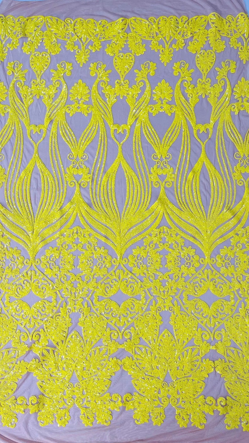 4 Way Stretch Fashion Design with Sequins Embroider on a 4 Way Stretch Mesh Fabric-Sold by The Yard. Yellow/Nude